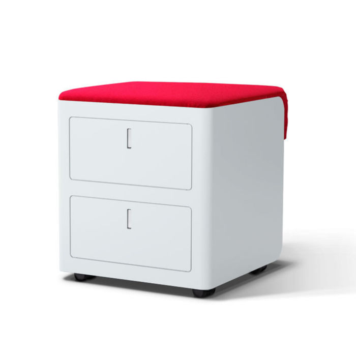 Sitting metal chest of drawers with red cushion